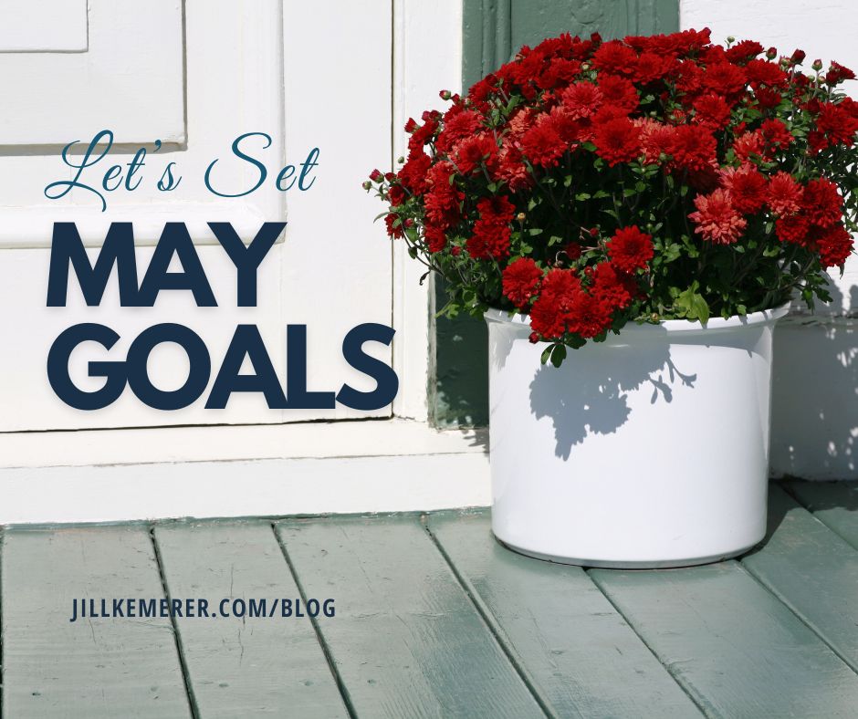 Front porch, white door, white planter with red mums. Text "Let's Set May Goals JillKemerer.com/Blog"